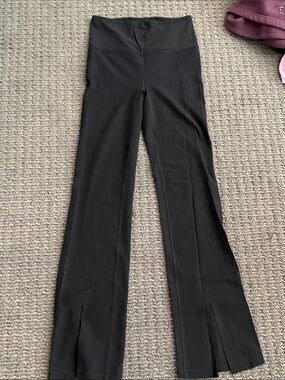 Athleta Black High-Rise Flare Yoga Pants with Front Slits